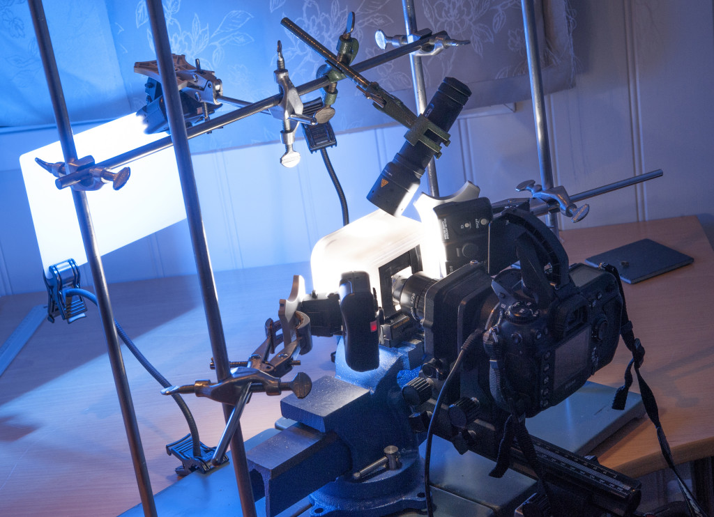 My rig with four laboratory stands, a set of macro flashes, bellows, focus light and camera.