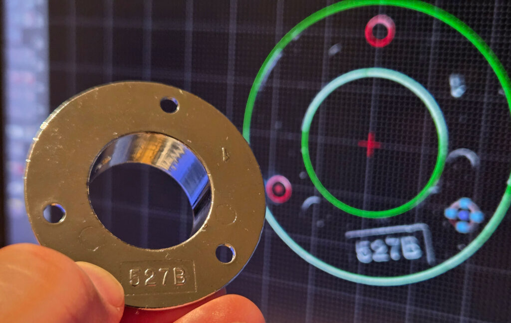 Using a scanned image of the collar to trace its outline in QCAD.