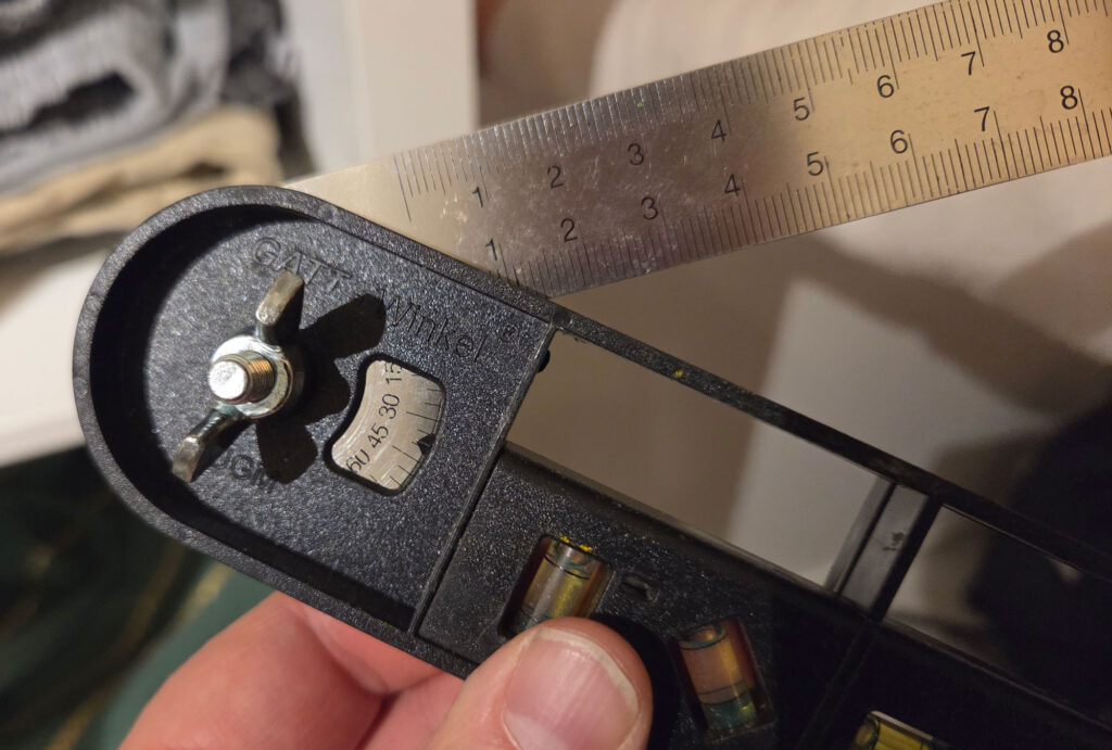 Measuring the angle of the mounting surface.